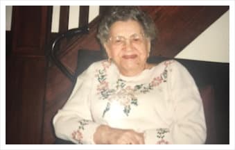 Senior woman smiling with caregiver